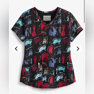 Skechers Black Scrub Top with Red, Blue, Purple and Teal Cat Print